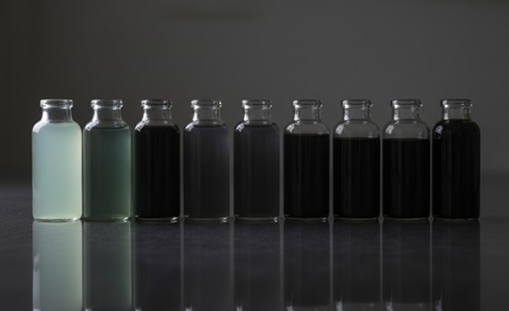 Aqueous Ti₃C₂Tₓ MXene colloids with concentration-dependent color.